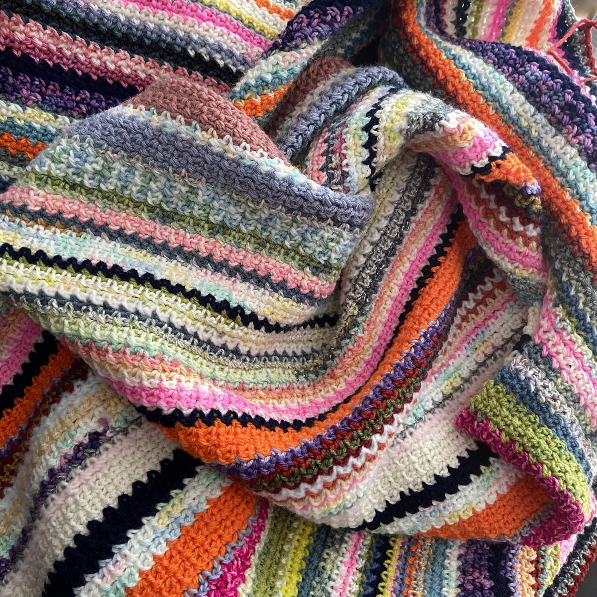 orange crochet doily with heart design